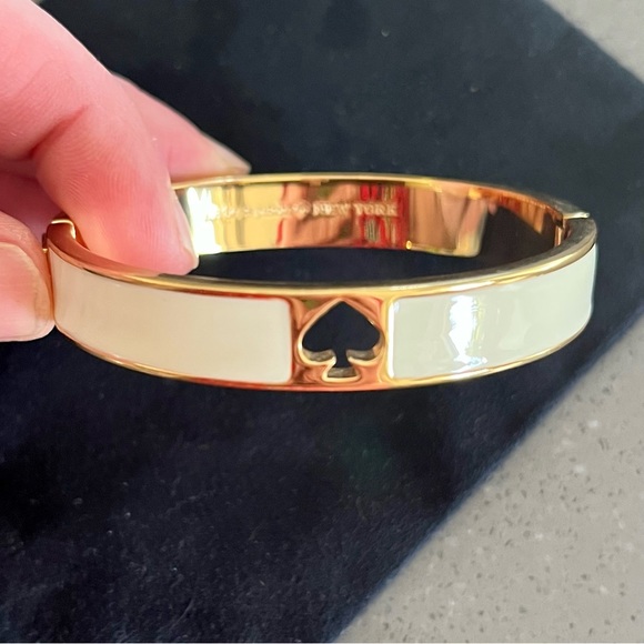 KATE SPADE ♠️ Cream/Gold Hole Punch 10mm Hinge Bangle (immaculate) - Picture 1 of 6